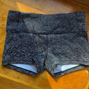 Like NEW lululemon size 6 running shorts with pockets. Black with white specks